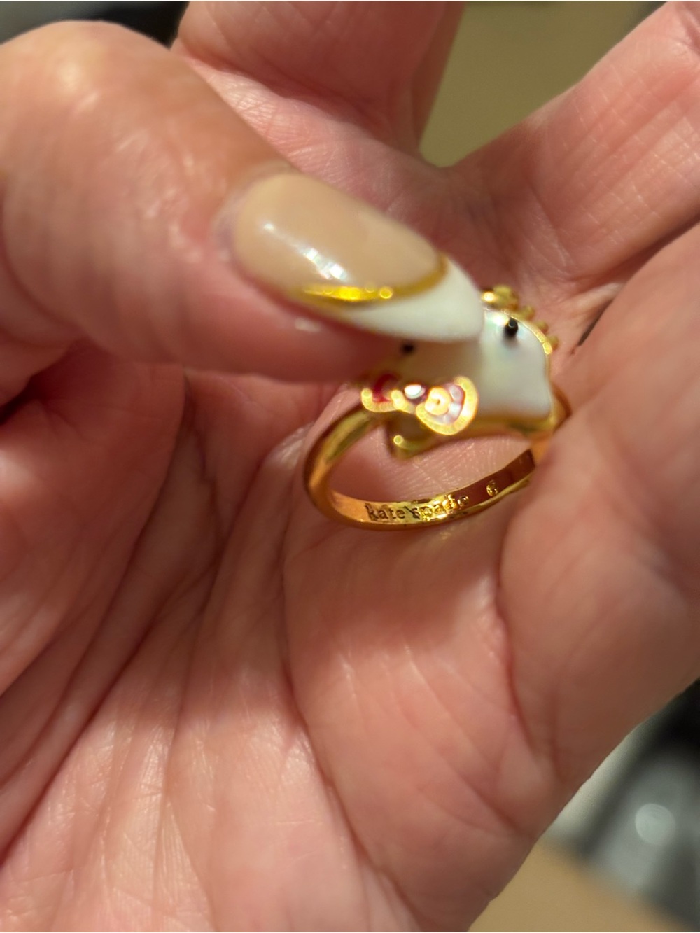 Hello Kitty Gold Tone Ring with White Enamel Face and Red Bow - - Picture 3 of 4